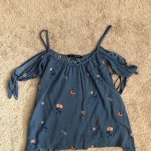 Blue off the shoulder shirt